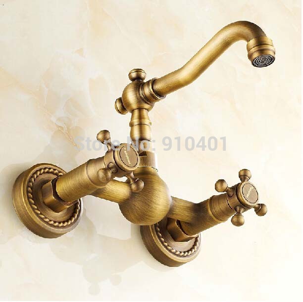 Wholesale And Retail Promotion Antique Brass Wall Mounted Bathroom Sink Faucet Swivel Spout Dual Handles Mixer