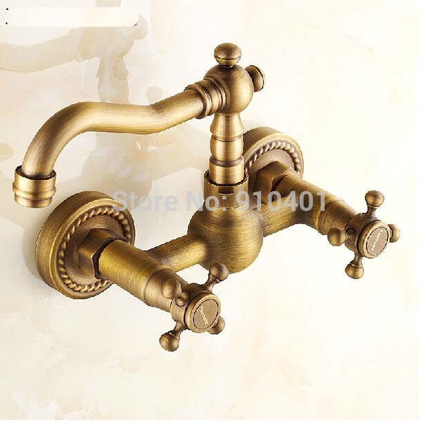 Wholesale And Retail Promotion Antique Brass Wall Mounted Bathroom Sink Faucet Swivel Spout Dual Handles Mixer